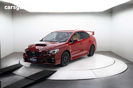 Red 2015 Subaru WRX Sedan Sti