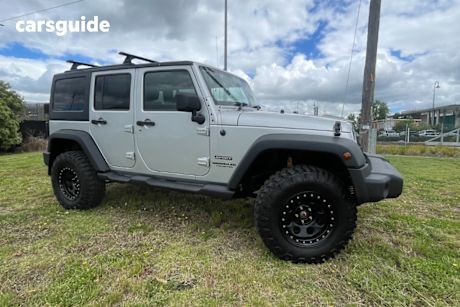 Silver 2011 Jeep Wrangler Softtop Unlimited Sport (4X4)