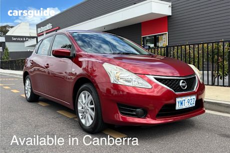 Red 2015 Nissan Pulsar Hatchback St