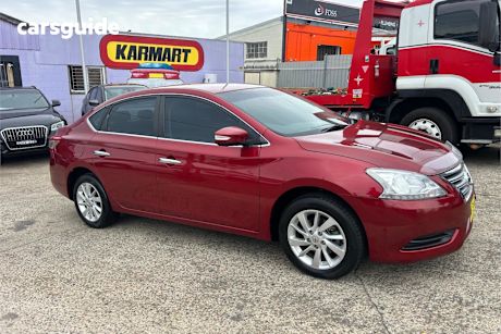 Red 2013 Nissan Pulsar Sedan St