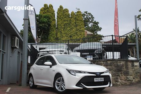 White 2021 Toyota Corolla Hatchback Ascent Sport Hybrid