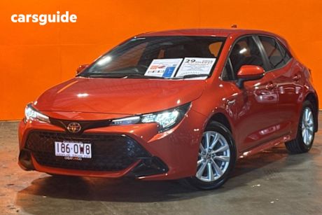 Orange 2024 Toyota Corolla Hatchback Ascent Sport Hybrid