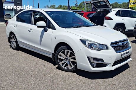 White 2015 Subaru Impreza Hatchback 2.0I Premium (Awd)