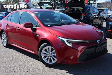 Red 2023 Toyota Corolla Sedan Ascent Sport Hybrid