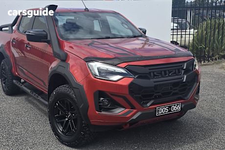 Orange 2024 Isuzu D-MAX Crew Cab Utility Blade