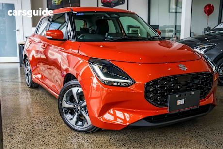 Orange 2025 Suzuki Swift Hatchback Hybrid Glx