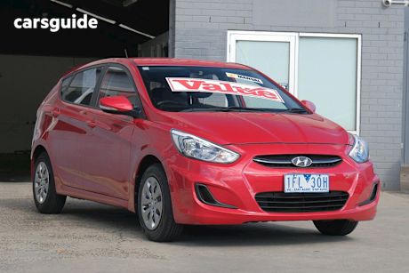 Red 2015 Hyundai Accent Hatchback Sr
