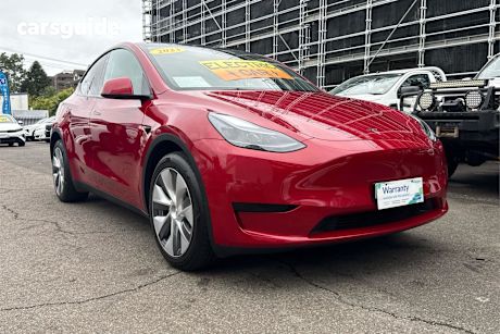 Red 2023 Tesla Model Y Wagon Rear-Wheel Drive
