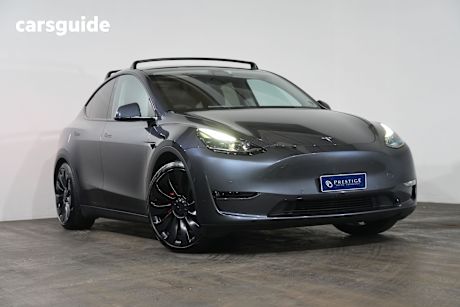 Silver 2023 Tesla Model Y Wagon Performance