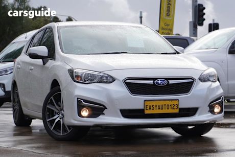 White 2017 Subaru Impreza Hatchback 2.0L (Awd)