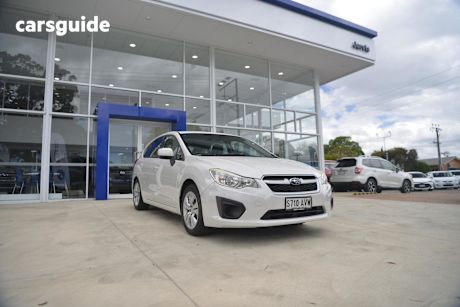 White 2012 Subaru Impreza Hatchback 2.0I (Awd)