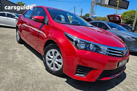 Red 2015 Toyota Corolla Sedan Ascent