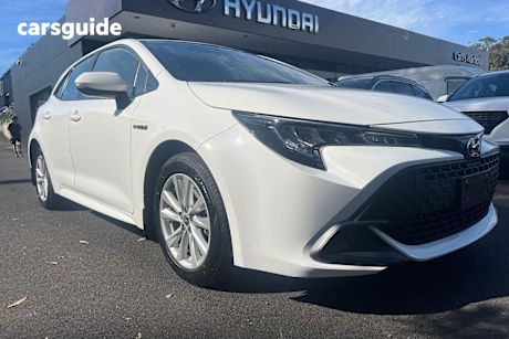 White 2023 Toyota Corolla Hatchback Ascent Sport Hybrid