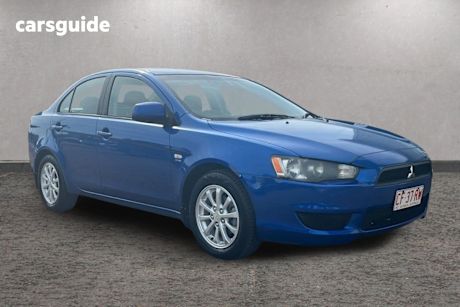 Blue 2011 Mitsubishi Lancer Sedan Sx