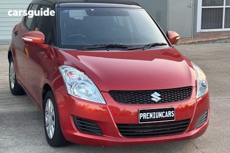 Orange 2011 Suzuki Swift Hatchback Ga