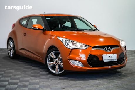 Orange 2014 Hyundai Veloster Coupe +