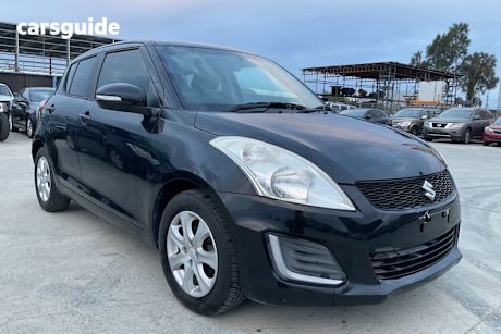 Black 2015 Suzuki Swift Hatchback Gl