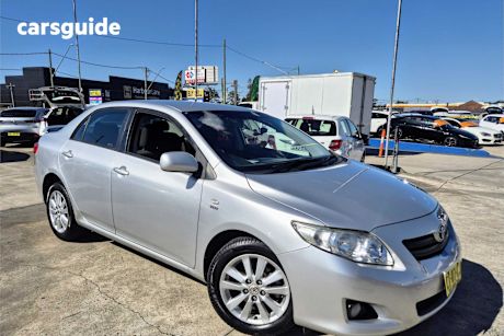 Silver 2010 Toyota Corolla Sedan Conquest