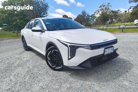 White 2025 Kia K4 Sedan Sport