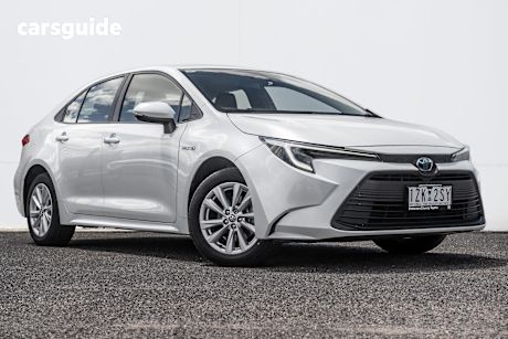 White 2023 Toyota Corolla Sedan Ascent Sport Hybrid