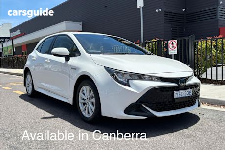 White 2023 Toyota Corolla Hatchback Ascent Sport Hybrid