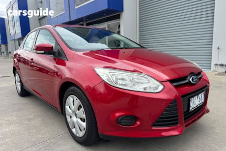 Red 2012 Ford Focus Sedan Ambiente