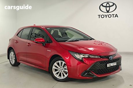 Red 2023 Toyota Corolla Hatchback Ascent Sport Hybrid