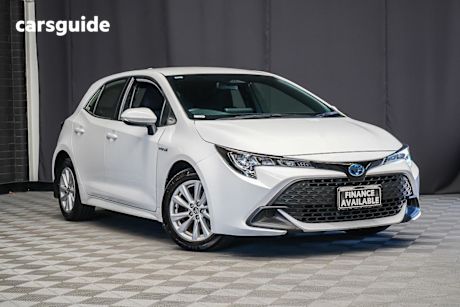 White 2024 Toyota Corolla Hatchback Ascent Sport + Conv Pk Hybrid