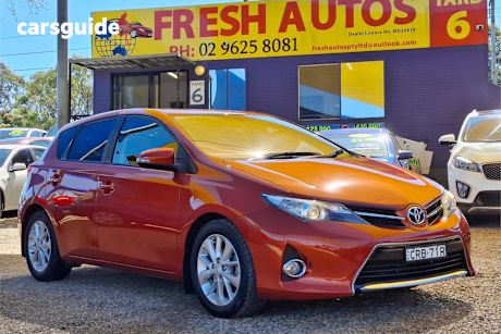 Orange 2013 Toyota Corolla Hatchback Ascent Sport