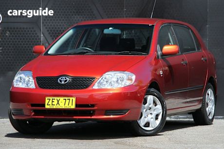 Red 2004 Toyota Corolla Hatchback Ascent Seca