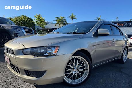 Gold 2011 Mitsubishi Lancer Sedan Sx