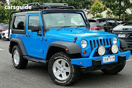 Blue 2012 Jeep Wrangler Softtop Sport (4X4)