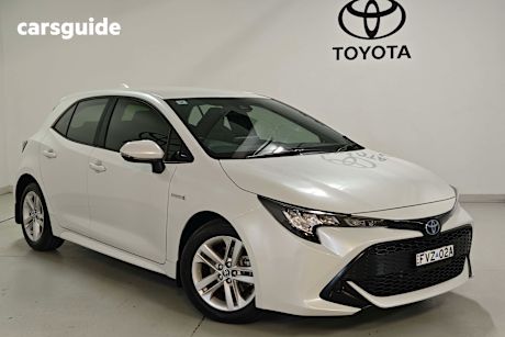 White 2021 Toyota Corolla Hatchback Ascent Sport Hybrid