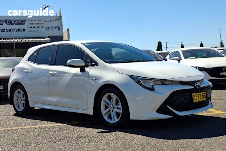 White 2021 Toyota Corolla Hatchback Ascent Sport Hybrid