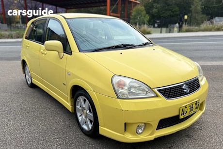 Yellow 2005 Suzuki Liana Hatchback