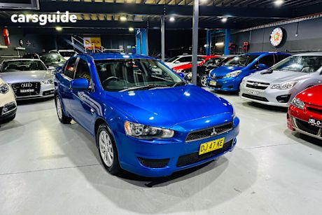 Blue 2011 Mitsubishi Lancer Sedan Sx