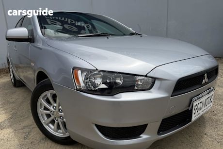 Silver 2011 Mitsubishi Lancer Sedan Sx
