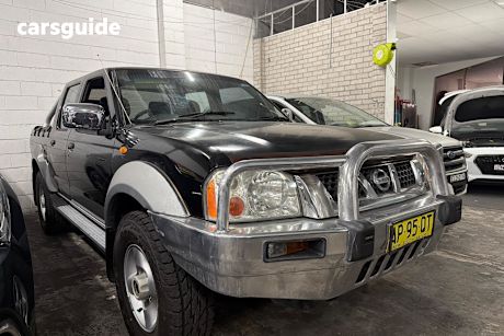 Black 2006 Nissan Navara Dual Cab Pick-up St-R (4X4)