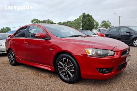 Red 2015 Mitsubishi Lancer Sedan Es Sport