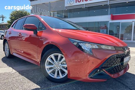 Orange 2025 Toyota Corolla Hatchback Sx Hybrid