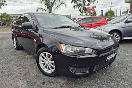 Black 2011 Mitsubishi Lancer Sedan Es