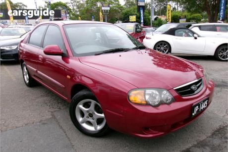 Red 2003 Kia Spectra Hatchback