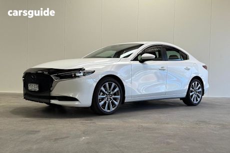 White 2024 Mazda 3 Sedan G20 Evolve