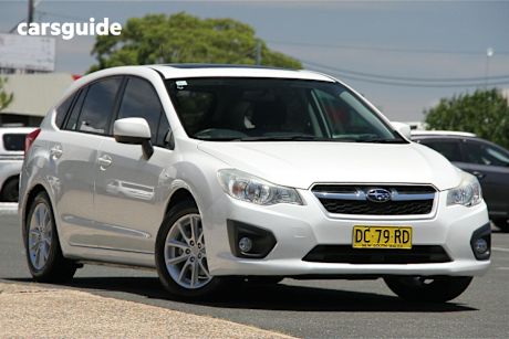 White 2012 Subaru Impreza Hatchback 2.0I-L (Awd)