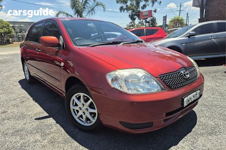 Red 2002 Toyota Corolla Hatchback Ascent Seca