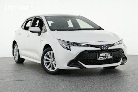 White 2024 Toyota Corolla Hatchback Ascent Sport + Conv Pk Hybrid