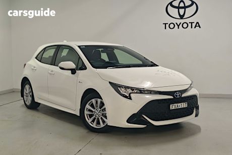White 2025 Toyota Corolla Hatchback Ascent Sport Hybrid