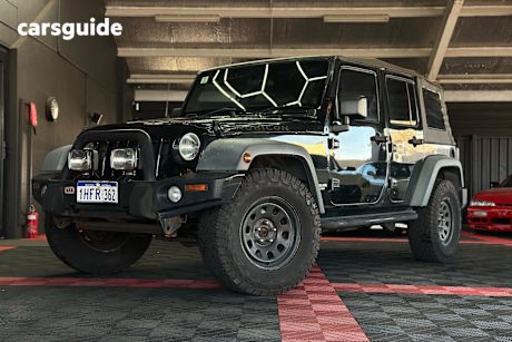 Green 2012 Jeep Wrangler Softtop Unlimited Rubicon (4X4)