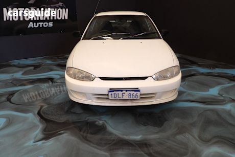 White 2000 Mitsubishi Lancer Coupe Gli