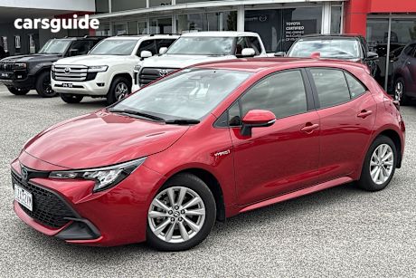 Red 2024 Toyota Corolla Hatchback Ascent Sport Hybrid